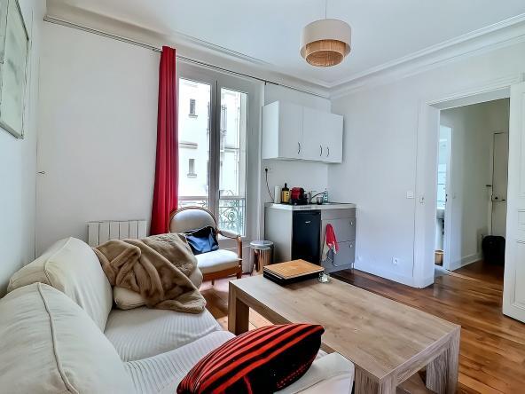 Séjour avec cuisine ouverte appartement Paris 5e rue Flatters